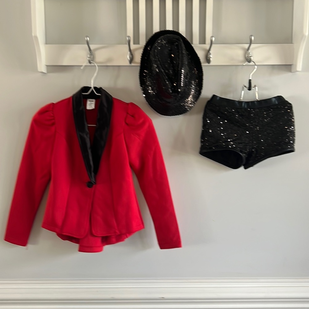 Jazz costume with red jacket and sequins shorts.
